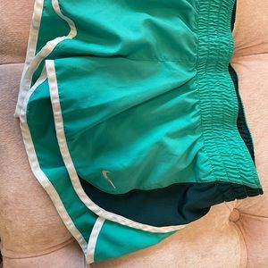 Green Nike running shorts, like new